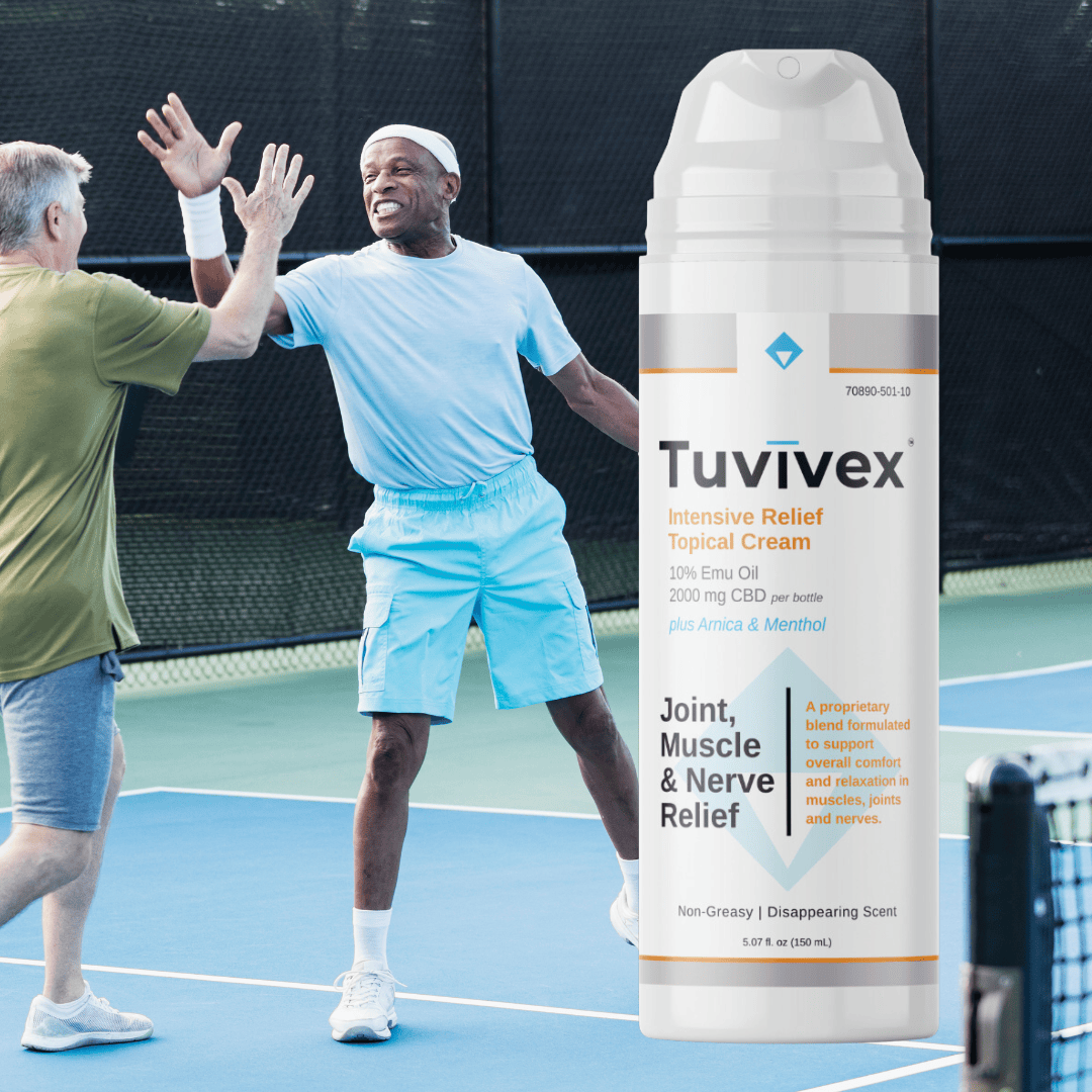Two tennis players smiling and high fiving on the tennis court with Tuvivex Intensive Relief Cream bottle next to him, offering fast-acting relief for joints, muscles, and discomfort in areas like hands, feet, knees, hips, shoulders, and back.